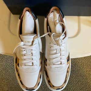 Cole Han white sneakers with leopard accents